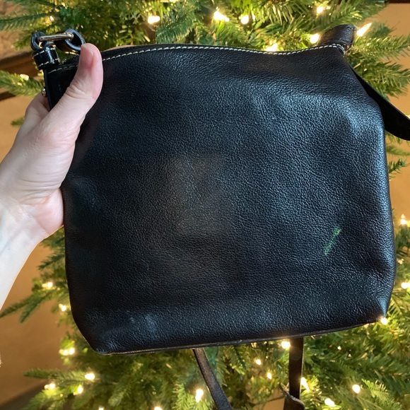 Black purse. Does have some wear and tear but great purse! - Picture 2 of 4